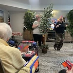 Avamere at Sandy senior living community offering assisted living, memory care, and respite care in Sandy, OR, residents enjoying entertainment