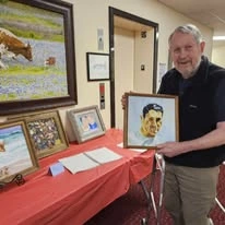 Alexis Estates Gracious Retirement Living by Hawthorn Senior Living, independent living in Allen, TX, resident showing painting