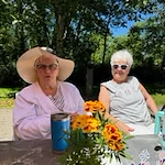 Avamere at Seaside senior living community offering independent living, assisted living, memory care, and respite care in Seaside, OR, residents enjoying time together outside