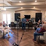 Wilshire Senior Living, independent living, assisted living, and memory care in Burleson, TX, residents playing chair volleyball and enjoying good community