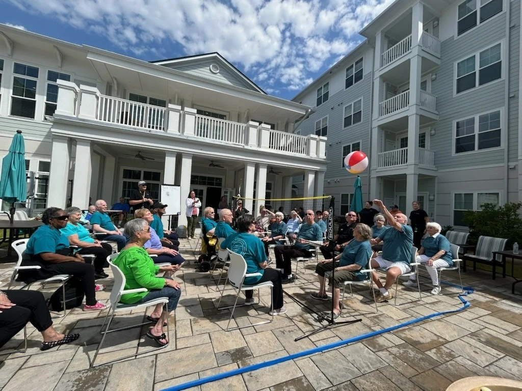 The Barclay at Little River residents having fun participating in a game outside