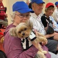 Northridge Gracious Retirement Living Hawthorn Senior Independent Living in Fishers, Indiana residents holding a dog