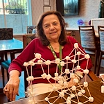 KindCare at Bristol, CT, proud resident with tower creation from engaging activity
