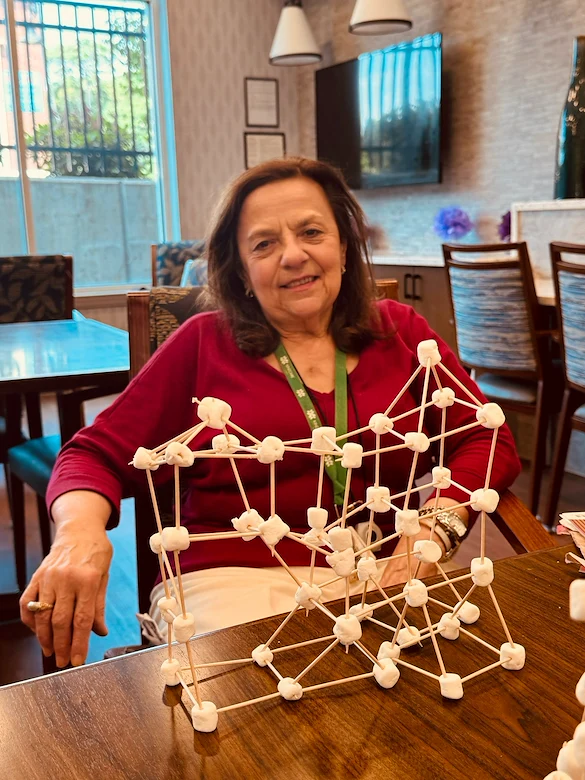 KindCare at Bristol, CT, proud resident with tower creation from engaging activity