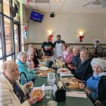 Williams Place Gracious Retirement Living Hawthorn Senior Independent Living in Davidson, North Carolina residents at a restaurant