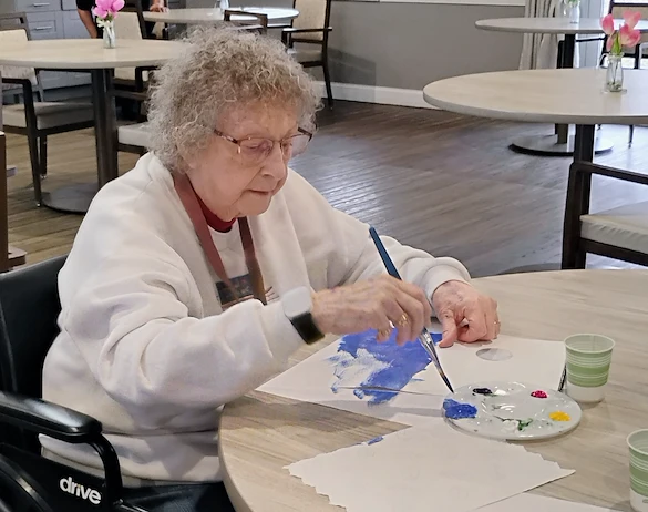 American House Westland Venoy senior living community offering independent living, assisted living, and respite care in Westland, MI, resident painting