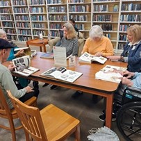The Blake at Carnes Crossroads residents visiting the Sangaree Library