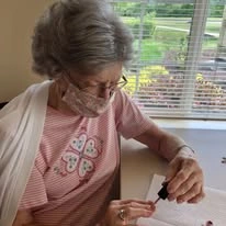 Sterling Heights Gracious Retirement Living Hawthorn Senior Independent Living in Bethlehem, Pennsylvania resident painting her nails