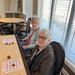 A couple Viva Senior Living residents getting in on playing bingo