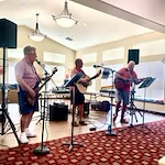 Willow Creek Gracious Retirement Living Hawthorn Senior Independent Living in Chesapeake, Virginia residents performing in a band
