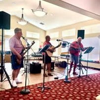 Willow Creek Gracious Retirement Living Hawthorn Senior Independent Living in Chesapeake, Virginia residents performing in a band
