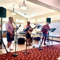 Willow Creek Gracious Retirement Living Hawthorn Senior Independent Living in Chesapeake, Virginia residents performing in a band
