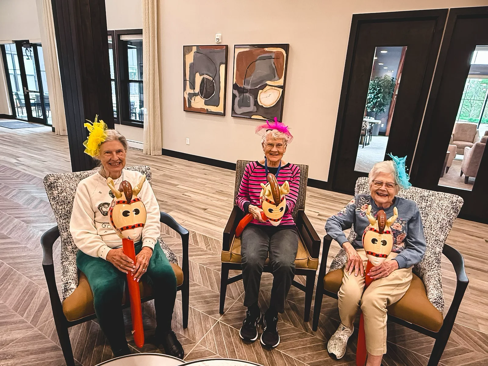 Featherstone at Hickory Hill smiling resident during an activity