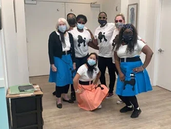 Staff in poodle skirts