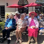 Covenant Living at Mount Miguel in Spring Valley, CA, smiling residents enjoying some sunshine