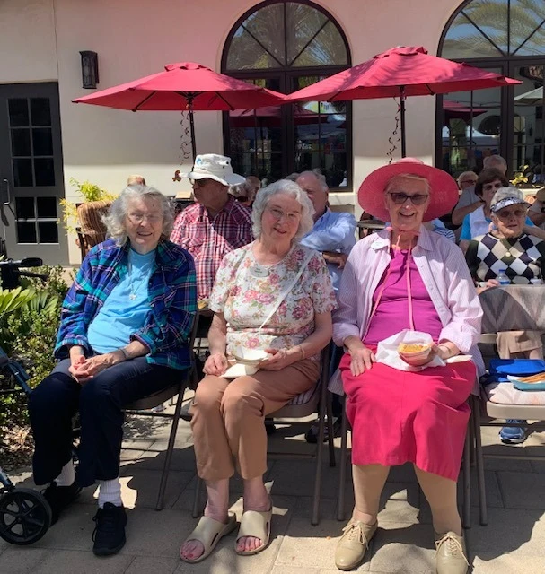 Covenant Living at Mount Miguel in Spring Valley, CA, smiling residents enjoying some sunshine