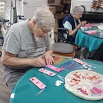 American House Sterling Heights, senior living community offering independent living and respite care in Sterling Heights, MI, residents doing arts and crafts
