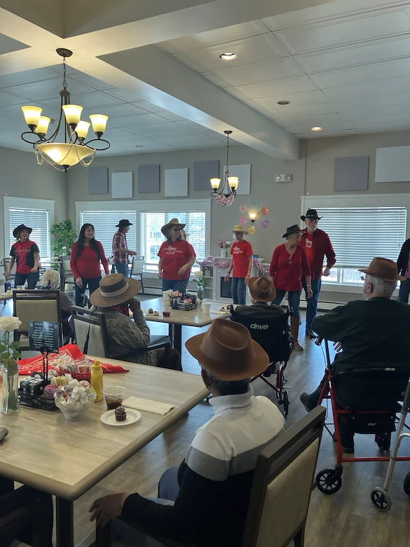 American House Farmington Hills, senior living community offering independent living, assisted living, memory care, and respite care in Farmington Hills, MI, residents enjoying entertaining performers