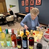 The Oaks At Lebanon Senior Living Community in Lebanon, Oregon resident making a plate of food