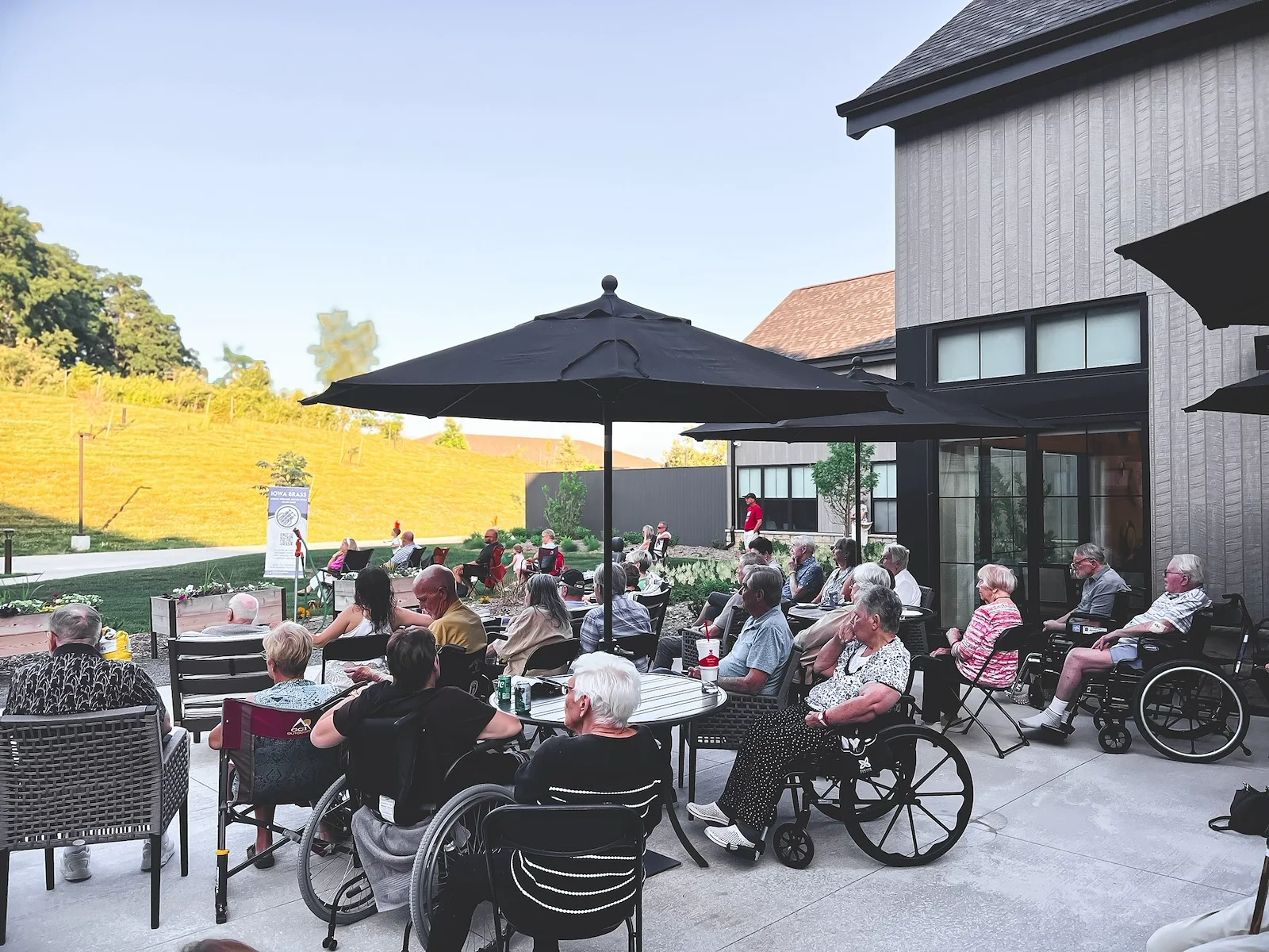 Featherstone at Hickory Hill smiling residents with entertainer