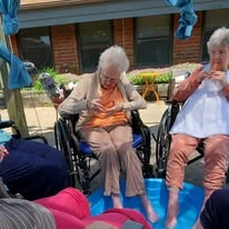 Ascension Living Sacred Heart Village Senior Living in Avilla, Indiana residents outside