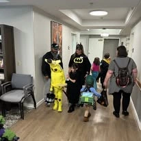 Avamere at Hillsboro Senior Living in Oregon residents celebrating Halloween with family