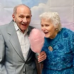 Camden Springs Gracious Retirement Living Hawthorn Senior Independent Living in Elk Grove, California resident couple eating cotton candy