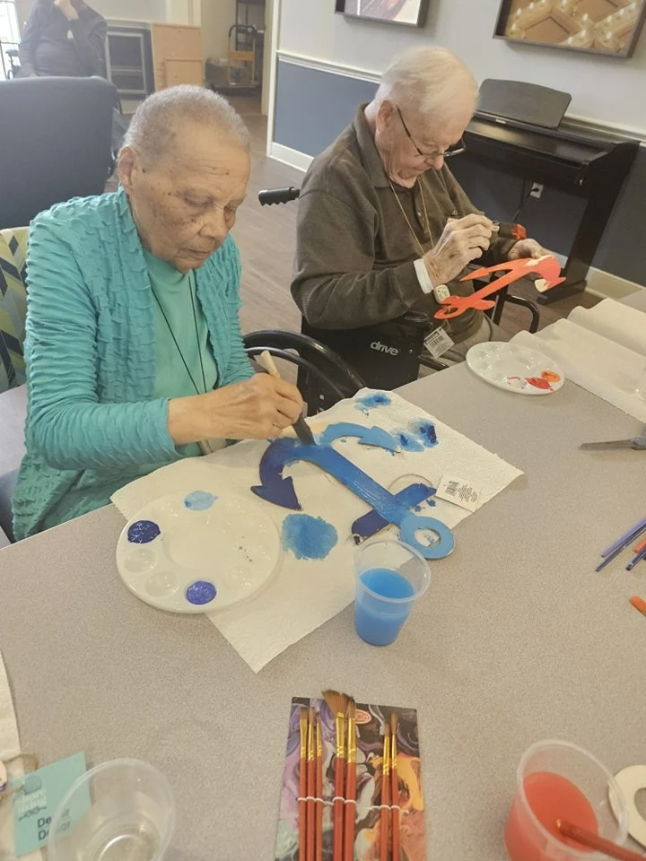 Charter Senior Living of Bowie resident activity - painting