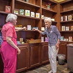 Franklin Park at Sonterra residents talking in the library