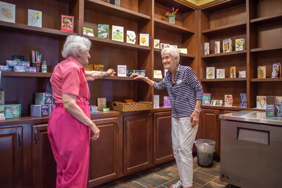 Franklin Park at Sonterra residents talking in the library