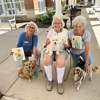 Covenant Living at The Holmstad in Batavia, IL, residents with their pets and a special art project