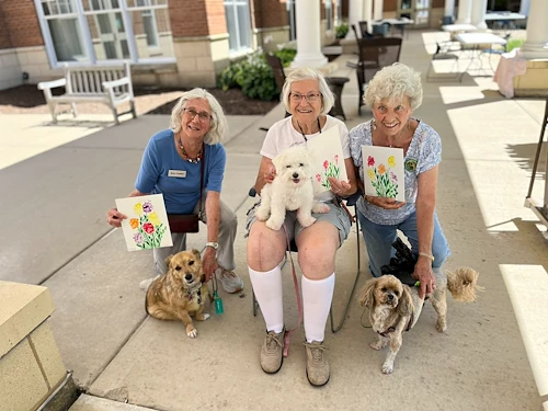 Covenant Living at The Holmstad in Batavia, IL, residents with their pets and a special art project