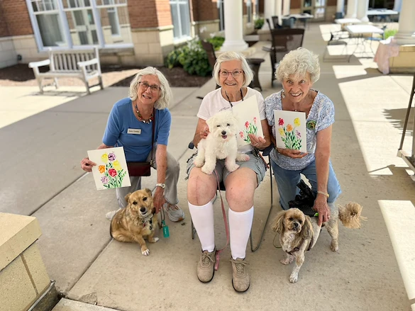 Covenant Living at The Holmstad in Batavia, IL, residents with their pets and a special art project