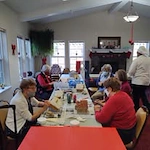 Summerville Estates Gracious Retirement Living Hawthorn Senior Independent Living in Summerville, South Carolina residents making festive gingerbread houses