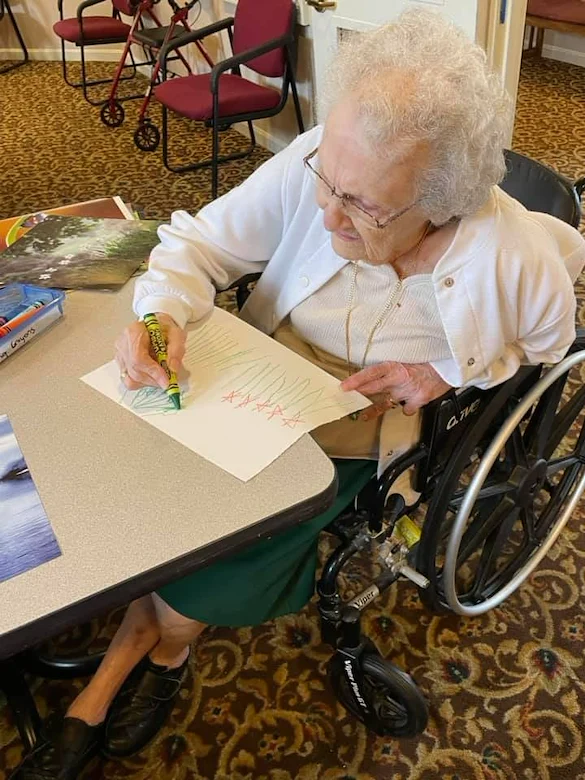 Hawthorne Woods by New Perspective in Washington, PA, resident engaged in coloring activity