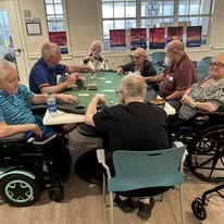 Sonata Coconut Creek seniors playing poker together