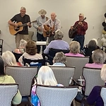 The Seasons@Alexandria (Assisted Living) residents enjoying listening to a band