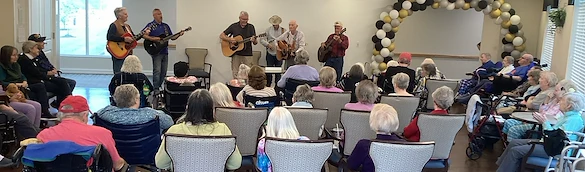 The Seasons@Alexandria (Assisted Living) residents enjoying listening to a band