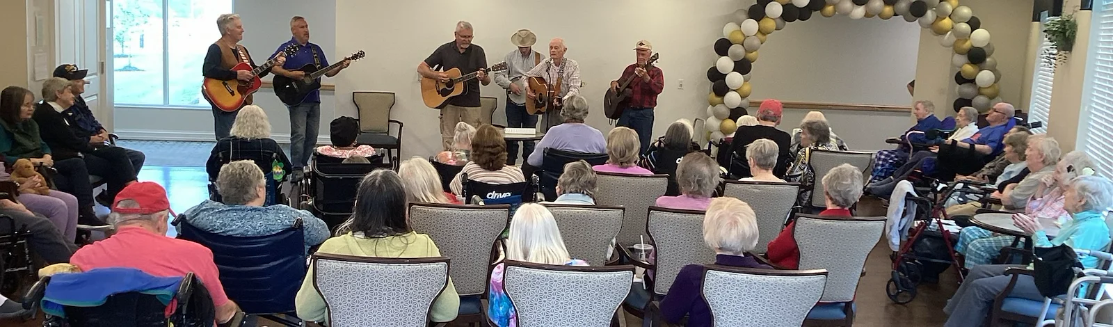 The Seasons@Alexandria (Assisted Living) residents enjoying listening to a band