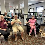 The Rio Grande Gracious Retirement Living Hawthorn Senior Independent Living in Rio Rancho residents with a dog
