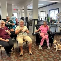 The Rio Grande Gracious Retirement Living Hawthorn Senior Independent Living in Rio Rancho residents with a dog