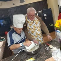 Magnolia Heights Gracious Retirement Living Hawthorn Senior Independent Living in Franklin, Massachusetts residents baking in the kitchen