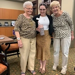 Covenant Living at The Holmstad in Batavia, IL, happy residents wearing matching patterns