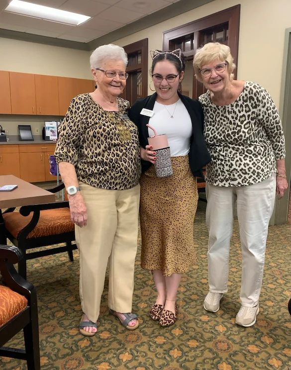 Covenant Living at The Holmstad in Batavia, IL, happy residents wearing matching patterns