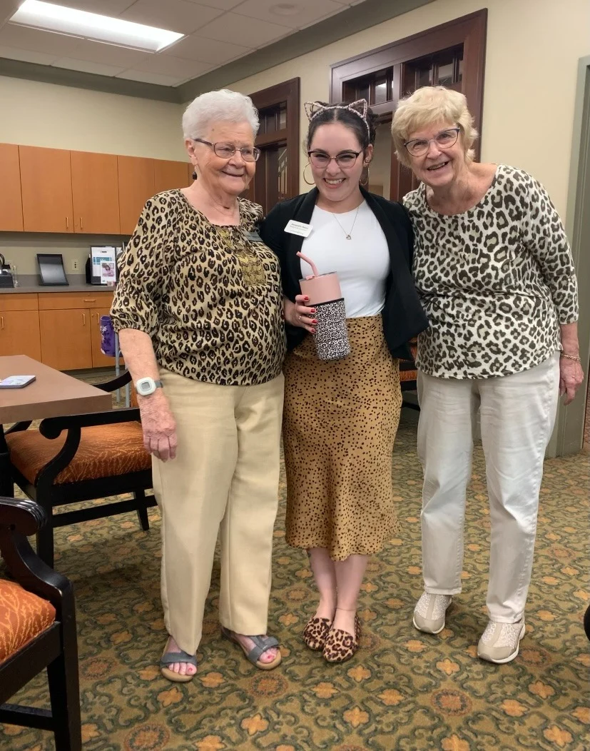 Covenant Living at The Holmstad in Batavia, IL, happy residents wearing matching patterns