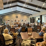 Park Vista Retirement Living - Camanche, IA, residents enjoy entertainment