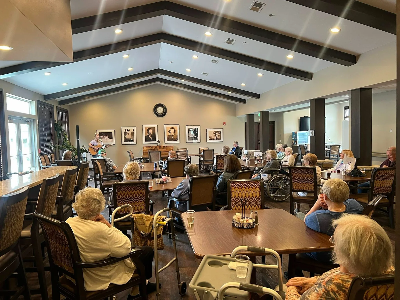 Park Vista Retirement Living - Camanche, IA, residents enjoy entertainment