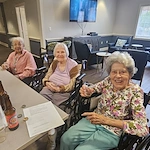 Charter Senior Living of Bowie residents enjoy spending time together and socializing