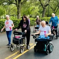 Sonata Coconut Creek seniors going for an outdoor walk together