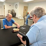 Jordan Oaks Gracious Retirement Living Hawthorn Senior Independent Living in Cary, North Carolina residents playing a game